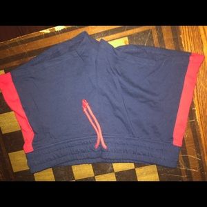 Blue shorts with red stripe